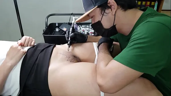 Watch a Tattoo Artist Seduce and Fuck His Client Girl with Creampie in 4K